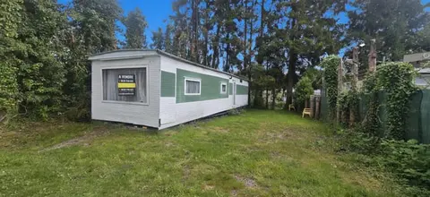 Residential caravan with land and pond view